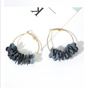 Blue flower petal hoop earrings gold tone